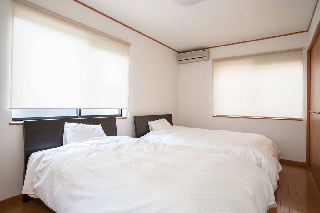 Guesthouse Iloha Киото Экстерьер фото