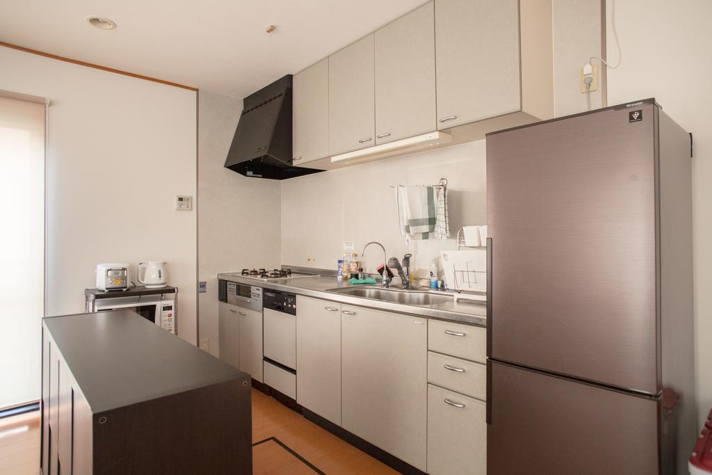 Guesthouse Iloha Киото Экстерьер фото